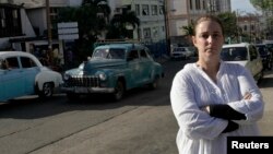 Cuban artist Tania Bruguera posses for a picture in Havana, Dec. 31, 2014. 