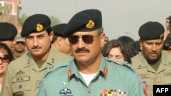 FILE - Major General Rizwan Akhtar arrives for a meeting, at the India-Pakistan Wagah Border Post, July 1, 2012.
