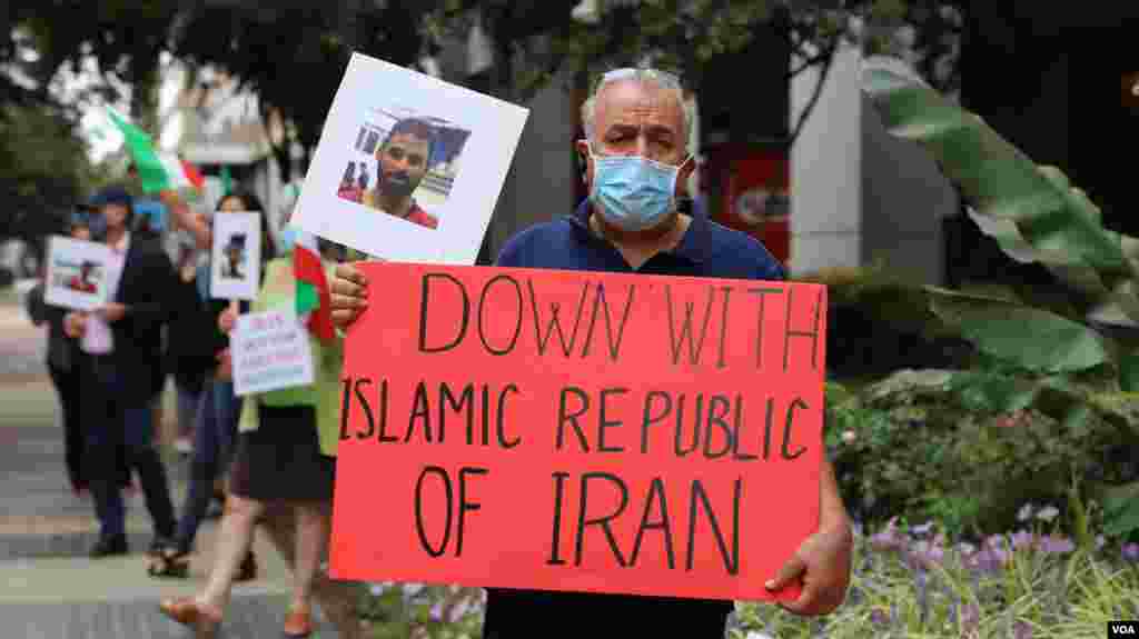 گروهی از آمریکایی‌های ایرانی‌تبار روز دوشنبه در مقابل دفتر حافظ از منافع جمهوری اسلامی در سفارت پاکستان در مرکز شهر واشنگتن جمع شد تا خشم خود را ابراز واعدام نوید افکاری، قهرمان کشتی را محکوم کنند.