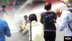 Phnom Penh police dispersed a protest with water canons from three separate fire trucks on Wednesday, after failing to negotiate with housing rights protesters.
