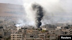 Kurdish Fighters Hold Off Islamic State Advance at Kobani