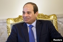 FILE - Egypt's President Abdel Fattah el-Sissi sits before a meeting at the presidential palace in Cairo, Aug. 2, 2015.