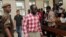 Tanzanian investigative journalist Erick Kabendera arrives at the Kisutu Residents Magistrate Court in Dar es Salaam, Tanzania, Aug. 19, 2019. 