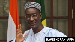 Moctar Ouane, alors ministre des affaires étrangères et de la coopération internationale du Mali, avant une rencontre avec le ministre indien des affaires extérieures Pranab Mukherjee à New Delhi, en Inde, le 16 janvier 2009. (Photo by RAVEENDRAN / AFP)