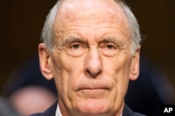 Director of National Intelligence Dan Coats listens while testifying on Capitol Hill in Washington, May 11, 2017, before the Senate intelligence committee.