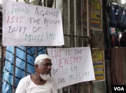 FILE - Anti-Islamic State posters are seen around a mosque in Kolkata, India, Dec. 5, 2015. (S. Azizur Rahman/VOA)