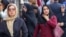 Women walk on a market street in Tehran on Sept. 15, 2024, on the second anniversary of a protest movement sparked by the death in custody of Mahsa Amini, arrested for allegedly violating the dress code for women. 