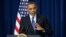 President Barack Obama gestures as speaks at the White House on Dec. 4, 2013.