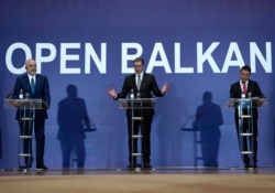 Serbian President Aleksandar Vucic, center, speaks during a press conference with Albanian Prime Minister Edi Rama, left, and North Macedonia Deputy Prime Minister Nikola Dimitrov after the economic forum for regional cooperation in Belgrade, Nov. 4, 2021.