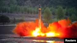 The long-range strategic ballistic rocket Hwasong-12 (Mars-12) is launched during a test in this undated photo released by North Korea's Korean Central News Agency (KCNA) on May 15, 2017.