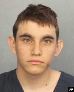 Authorities say Nikolas Cruz, a former student, opened fire at Marjory Stoneman Douglas High School in Parkland, Fla., Wednesday, Feb. 14, 2018, killing 17 people. (Broward County Jail via AP)