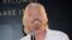 FILE - Virgin Group founder Richard Branson speaks at the Grey Goose Vodka and Virgin Galactic global partnership announcement event at the Rose Center for Earth & Space.