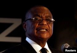 FILE PHOTO: Zimbabwe's Vice-President Constantino Chiwenga speaks at a mining investment conference in Harare, Zimbabwe, Feb. 28, 2018.