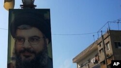 Pictures of Hezbollah leader Hassan Nasrallah decorate the streets in many parts of southern Lebanon