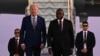US President Joe Biden is welcomed by Angola Foreign Affairs Minister Tete Antonio on arrival at Quatro de Fevereiro Luanda International Airport in Luanda on Dec. 2, 2024.