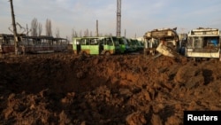 Картер, по руски ракетен напад врз паркинг за јавен превоз, руски напад врз Украина, во Харков, Украина, 20 декември 2023 година.