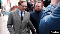 FILE - Alexander Nix, CEO of Cambridge Analytica, arrives at the offices of Cambridge Analytica in London, March 20, 2018.