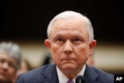 FILE - Attorney General Jeff Sessions listens at the beginning of a House Judiciary Committee hearing on Capitol Hill, Nov. 14, 2017 in Washington.