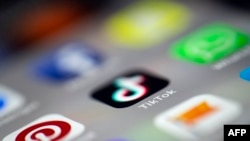 FILE - The TikTok icon is seen on a mobile phone.