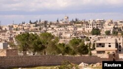 A general view shows Khan al-Assal area near the northern city of Aleppo, Syria, near the site where forces loyal to Syria's President Bashar al-Assad claim was Tuesday's chemical weapon attack, March 23, 2013.