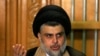 Moqtada al-Sadr prend la parole lors d’une conférence de presse à Najaf, en Irak, le 17 mai 2018.