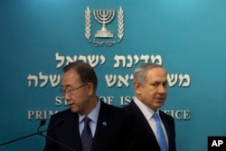 United Nations Secretary-General Ban Ki-moon, left, and Israeli Prime Minister Benjamin Netanyahu, arrive to a press conference at the Prime Minister’s office in Jerusalem, Oct. 20, 2015.