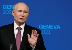 Russian President Vladimir Putin gestures as he speaks during a news conference after his meeting with U.S President Joe Biden at Villa La Grange in Geneva, Switzerland, June 16, 2021.