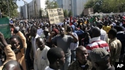 Malians demonstrate in capital Bamako to call for international military intervention to regain control of country's Islamist-controlled north Dec. 8, 2012