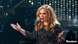 British singer Adele perfoms the song "Skyfall" from film "Skyfall," nominated as best orginal song, at the 85th Academy Awards in Hollywood, California Feb. 24, 2013.