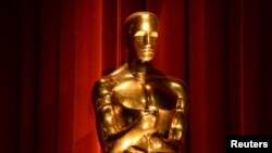FILE - An Oscar statue is seen during the nominations announcements for the 88th Academy Awards in Beverly Hills, California, Jan. 14, 2016.
