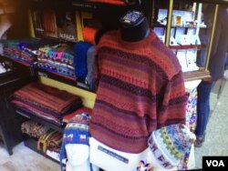 Clothing and accessories made from alpaca wool are among the bestselling items at the Downtown Holiday Market in Washington, DC. (J.Taboh/VOA)