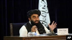 Taliban spokesman Zabihullah Mujahid speaks during a press conference in Kabul, Afghanistan, Sept. 7, 2021.