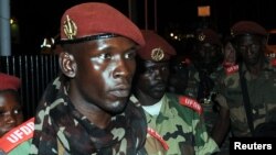 Soldiers from Central African Republic's Seleka rebel group arrive at the airport ahead of planned peace talks with the Central African Republic's government, Libreville, Gabon, Jan. 7, 2013. 