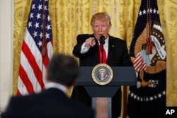 President Donald Trump speaks during a news conference, Feb. 16, 2017, in the East Room of the White House in Washington.