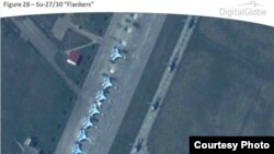 An image released by NATO on April 10, 2014 that shows fighter jets and helicopters at Primorko-Akhtarsk Air Base, Russia, near Ukraine. (DigitalGlobe/NATO ACO PAO)