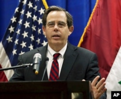 FILE - In this Oct. 1, 2015, photo, Stuart Jones speaks at a news conference at the U.S. Embassy in Baghdad, Iraq.