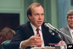 FILE - In this May 9, 1989 file photo, Dr. James Hansen, director of NASA's Goddard Institute for Space Studies in New York, testifies before a Senate Transportation subcommittee on Capitol Hill in Washington, D.C., a year after his history-making testimony telling the world that global warming was here and would get worse.
