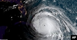 In this satellite image, you can clearly see the eye of Hurricane Irma as the storm approaches Cuba and Florida, Sept. 8, 2017.