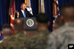 President Donald Trump speaks at Fort Myer in Arlington Va., Aug. 21, 2017, during a Presidential Address to the Nation about a strategy he believes will best position the U.S. to eventually declare victory in Afghanistan.