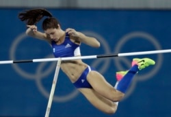 Greece's Ekaterini Stefanidi competes in the women's pole vault final, during the athletics competitions of the 2016 Summer Olympics at the Olympic stadium in Rio de Janeiro, Brazil, Aug. 19, 2016