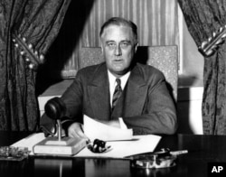 This photo was taken moments before U.S. President Franklin D. Roosevelt began his historic fireside chat to the American people on March 12, 1933.