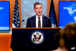 FILE - State Department spokesman Ned Price speaks at the State Department in Washington, Aug. 18, 2021.