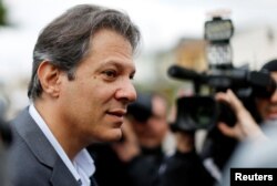 Workers Party vice presidential candidate Fernando Haddad, arrives to the Federal Police headquarters, where Brazilian former President Luiz Inacio Lula da Silva is imprisoned, in Curitiba, Brazil, Sept. 10, 2018.