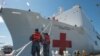 The USNS Mercy, a Navy hospital ship, is seen docked at Naval Base San Diego, March 18, 2020.