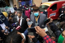 FILE - Event organizer Richard Cisneros arrives to the National Congress to deliver documents for an ongoing investigation into his hiring at the Ministry of Culture, in Lima, Peru, Sept. 11, 2020.