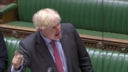 FILE - Britain's Prime Minister Boris Johnson gestures as he speaks during the weekly question time debate in Parliament in London, Sept. 30, 2020, in this screen grab taken from video.