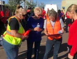 Then-Mayor Thelda Williams (second from left) attends a neighborhood smoke alarm awareness walk, October 2018. (City of Phoenix)