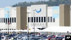 FILE - An Amazon warehouse is shown in Bessemer, Ala., March 30, 2021. 