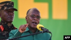 FILE - In this Aug. 29, 2020 photo, Tanzania's President John Magufuli speaks during a campaign event in Dodoma, Tanzania. Magufuli has not been seen in public in almost two weeks, raising concerns about his health.