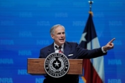 FILE - Texas Governor Greg Abbott speaks in Dallas, Texas, May 4, 2018.